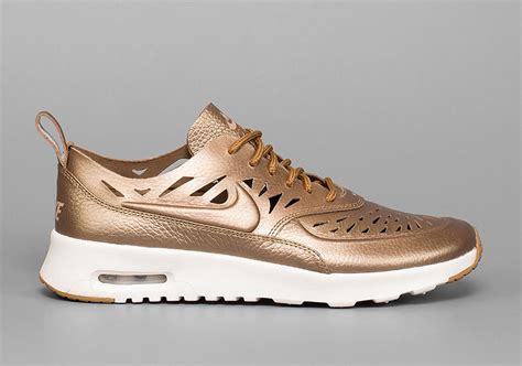 nike air max thea bronze flower baby schuhe|nike air max thea feet.